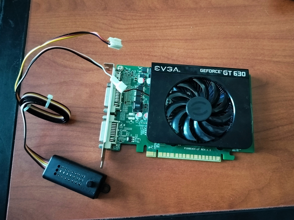 EVGA GT 630 video card with external fan controller connected to its cooling fan.